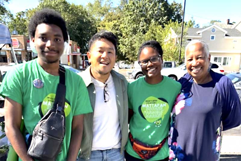 Herman Saksono (second from left) and Vivien Morris (right) along with other members of the Mattapan Food and Fitness Coalition
